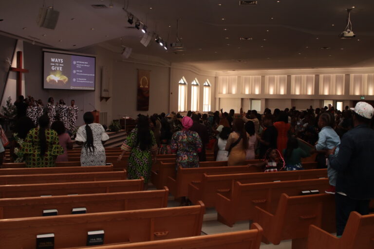 Potter’s House congregation worshipping together